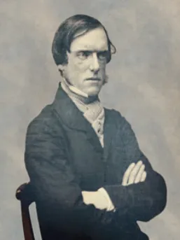 Old photographic portrait of John Robert Godley with arms folded